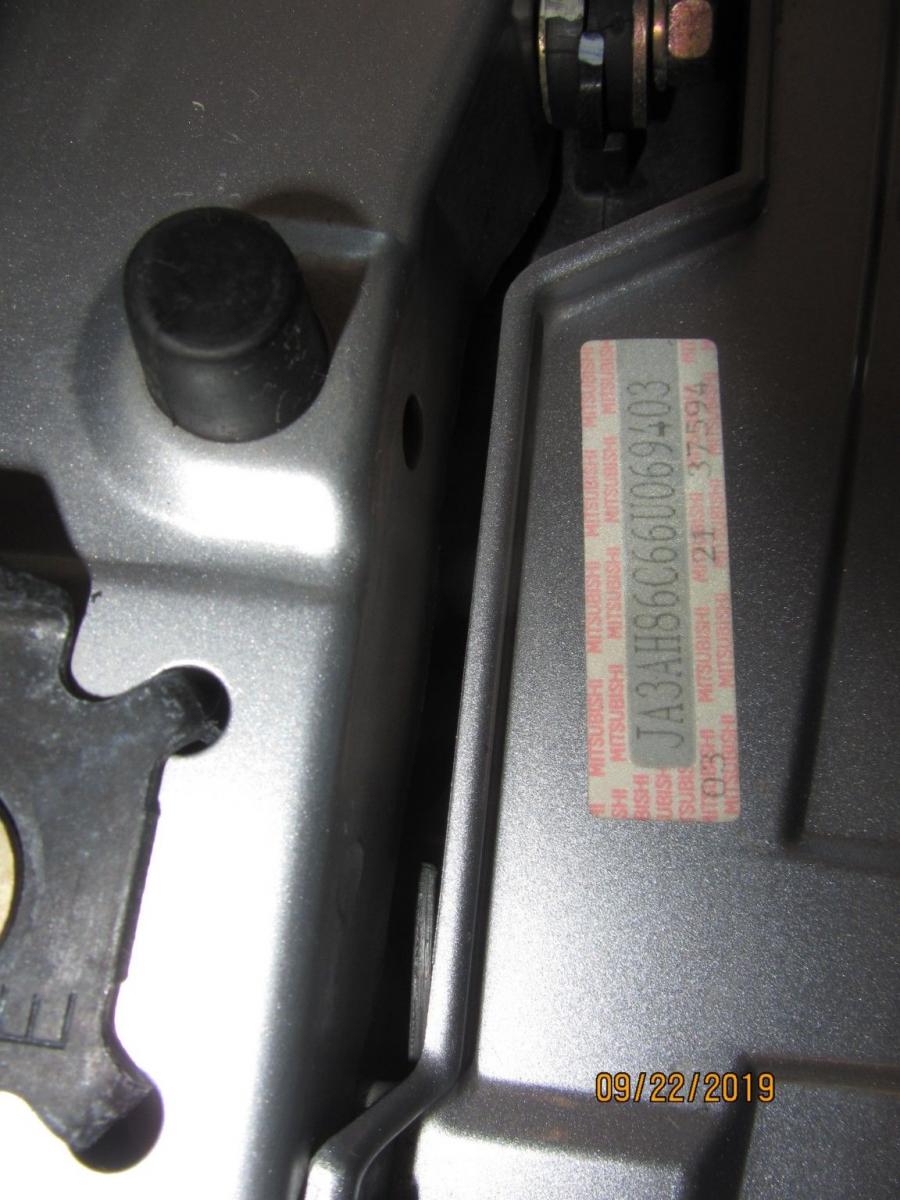 Mitsubishi Lancer Evolution IX MR 2006 года  (фото 52 из 69)